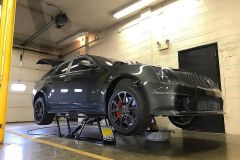 cadillac-lifted-on-quickjack-lift